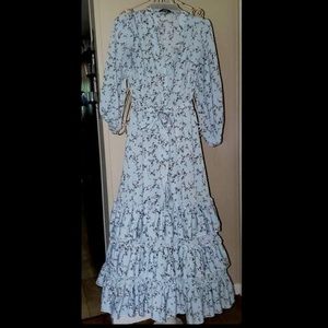 vintage style blue maxi dress with floral pattern, also with tiny ruffles